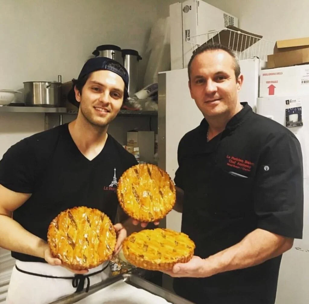 Chef Anthony Roche with his son in the Parisien Bakery kitchen